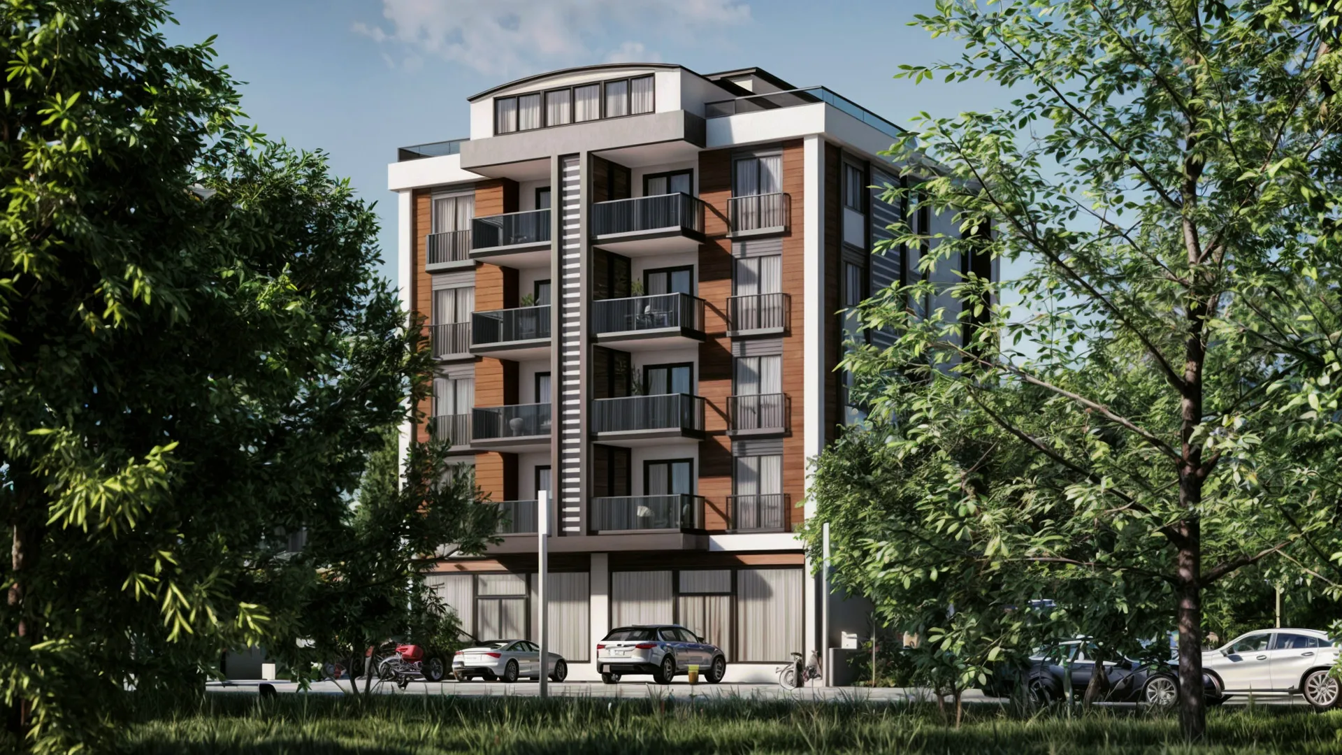 Building design featuring wide balconies and commercial units on the ground floor.